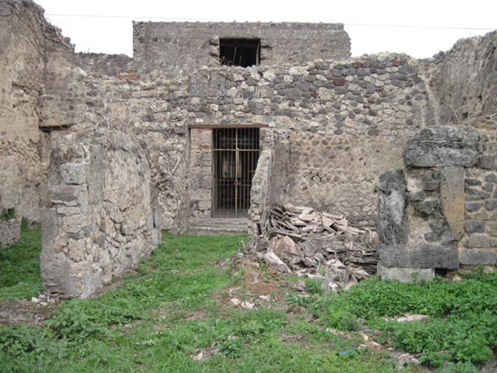 I.3.29 Pompeii. September 2010. Looking east from room 1 the atrium, towards fauces and doorway onto Vicolo del Citarista. The doorways to room 2 on the north side and room 6 on the south side are visible. Photo courtesy of Drew Baker.