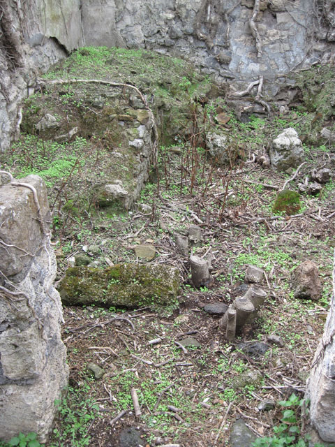 I.3.30 Pompeii. September 2010. Room 1, looking west towards detail of hearth feature near west wall. Photo courtesy of Drew Baker.