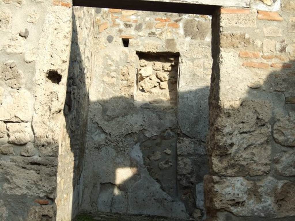 I.4.4 Pompeii. December 2007. Doorway into rear room that contained a small hearth and staircase to upper floor. See Eschebach, L., 1993. Geb�udeverzeichnis und Stadtplan der antiken Stadt Pompeji. K�ln: B�hlau. (p.26).
