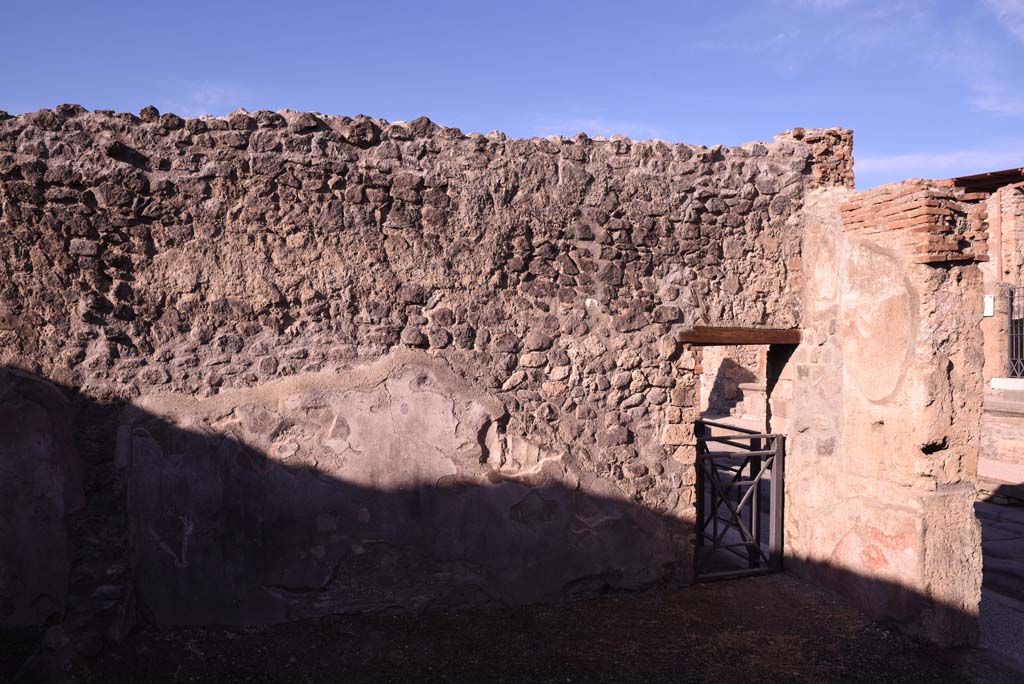 I.4.23 Pompeii. October 2019. Looking towards west wall of shop-room, with doorway into entrance corridor of I.4.22. 
Foto Tobias Busen, ERC Grant 681269 D�COR.

