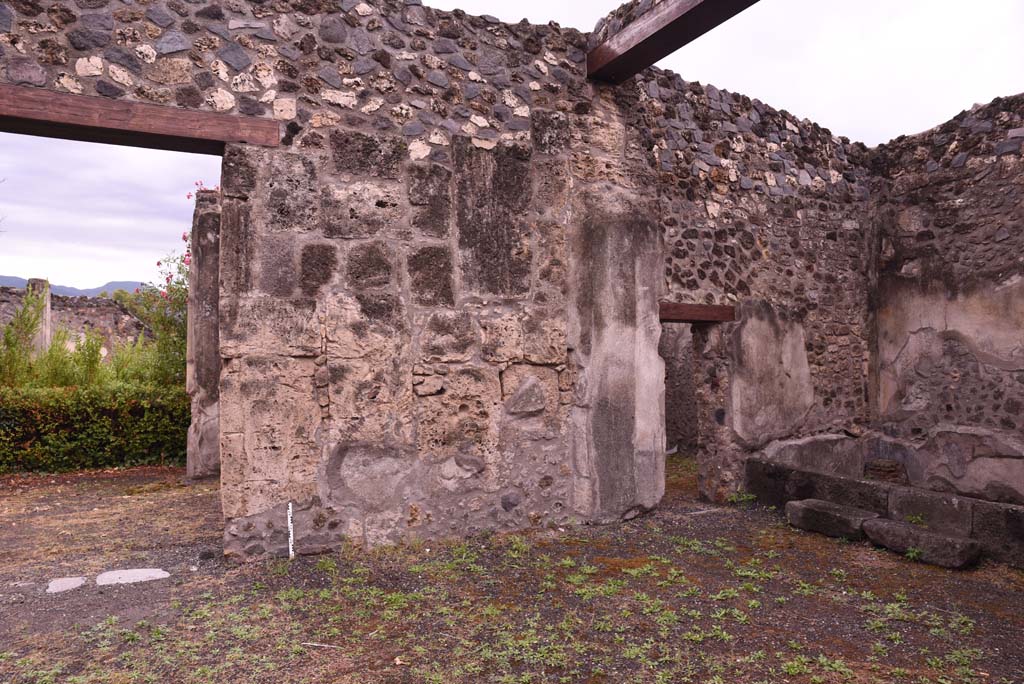 I.4.25 Pompeii. September 2019. 
Room 47, south wall of atrium on west side of doorway to upper peristyle.
The doorway to room 51, is on right, with doorway in south wall into room 52, centre right.
Foto Tobias Busen, ERC Grant 681269 D�COR.
