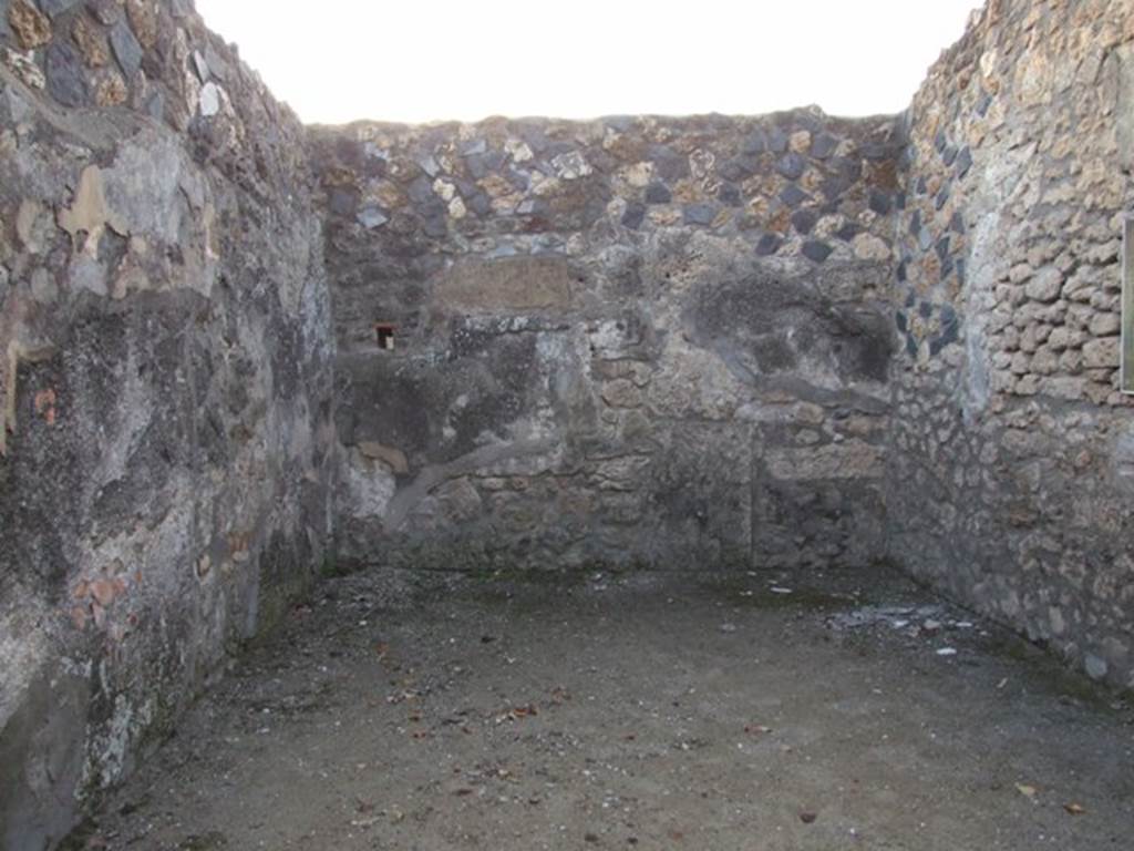 I.4.25 Pompeii. December 2007. Room 37, triclinium on west side of lower peristyle. 
Looking at west wall. The west wall used to have a wall painting of Endymion and Selene.
The south wall used to have a wall painting of Adonis and Aphrodite. 
Both these paintings are now lost. The floor was black and white marble.
There seems to be some confusion as to what was on the south or west walls, see Warscher above.
According to Warscher � on the west wall one cannot see any traces of decoration.
The room gives the impression of total devastation: it was difficult to show that it had been adorned with paintings.
(Sulla parete ovest non si vede nessuna traccia di decorazione.
La stanza da l�impressione d�una devastazione totale: era difficile rappresentarci che essa fosse adorna di quadri.)
See Warscher, T. 1942. Catalogo illustrato degli affreschi del Museo Nazionale di Napoli. Sala LXXXII. Vol.4. Rome, Swedish Institute
