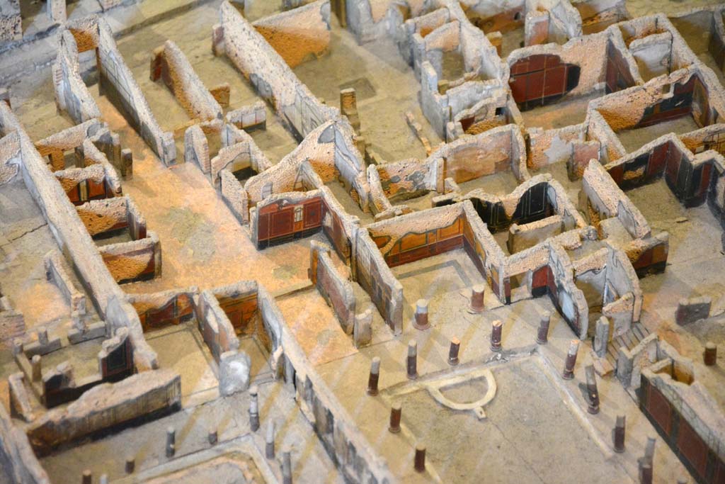 I.4.25/1.4.5 Pompeii. May 2019. Detail from model in Naples Archaeological Museum.
Looking north-west from above Middle Peristyle 17, lower centre right, and Tablinum 14 leading into atrium of I.4.5, centre left.
Foto Tobias Busen, ERC Grant 681269 D�COR.
