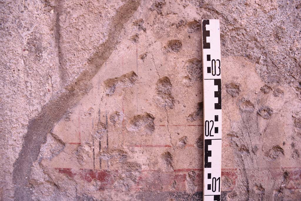 I.4.25 Pompeii. October 2019. Room 44, cubiculum, detail of lower north-west corner in alcove.
Foto Tobias Busen, ERC Grant 681269 D�COR.

