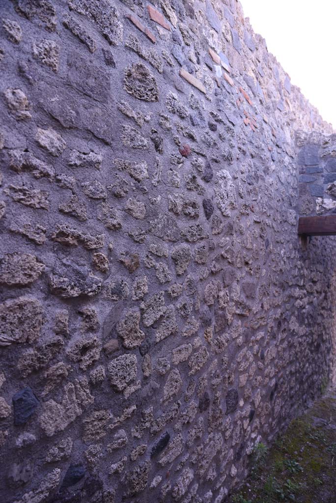 I.4.25/I.4.5 Pompeii. October 2019. 
Looking south along east wall from north end of Corridor 13A, or unnumbered corridor. 
Foto Tobias Busen, ERC Grant 681269 D�COR.
