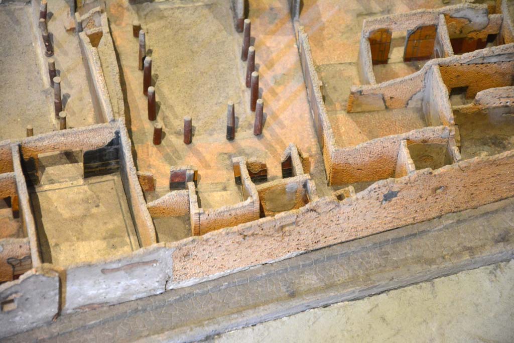 I.4.25 Pompeii. Upper Peristyle 56. May 2019. Detail from model in Naples Archaeological Museum. 
Looking at east end of upper peristyle 56, with rooms 59 to 64, lower centre.
Foto Tobias Busen, ERC Grant 681269 D�COR.
