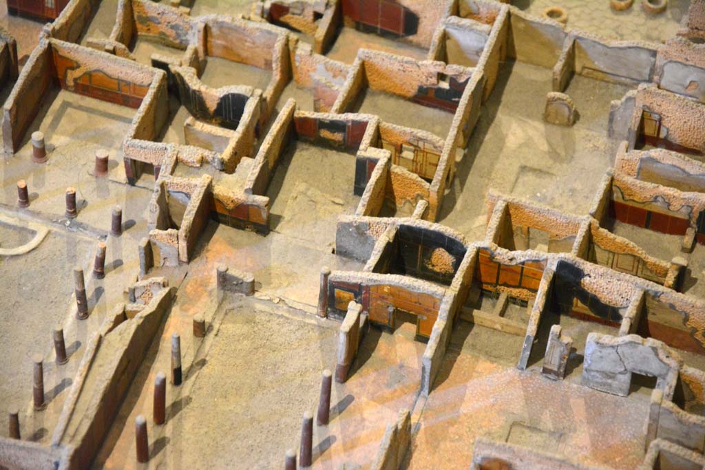 I.4.25 Pompeii. May 2019. Detail from model in Naples Archaeological Museum.
West end of Upper Peristyle 56, in centre, with room 57 above it.
Foto Tobias Busen, ERC Grant 681269 D�COR.
