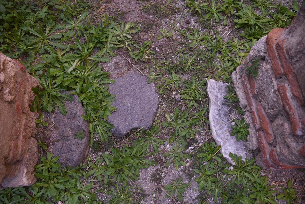 I.4.28 Pompeii. October 2019. Room 27, detail of threshold, looking north from room 26. 
Foto Tobias Busen, ERC Grant 681269 D�COR.
