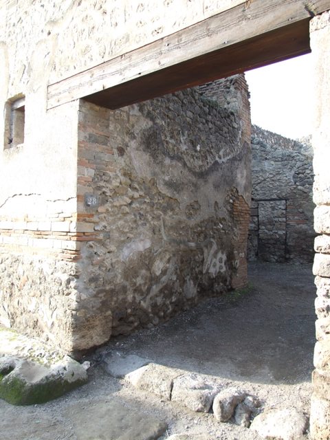 I.4.28 Pompeii. December 2005. Exterior side wall on Vicolo del Citarista.