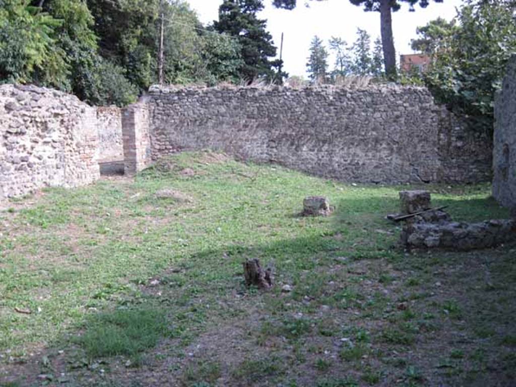I.5.3 Pompeii. September 2010. Looking south across large open area, with the entrance doorway in the east wall, on the left. Photo courtesy of Drew Baker.