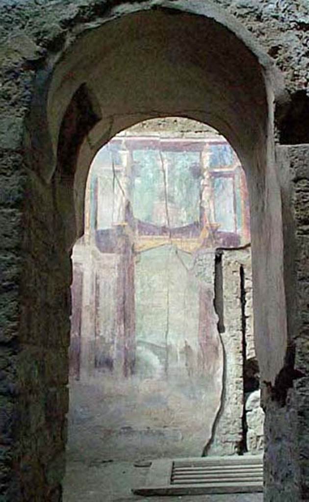 I.6.2 Pompeii. December 2007.
Looking north through arched doorway to frigidarium.