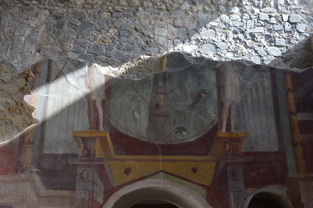 I.6.2 Pompeii. September 2019. Detail from south wall above arched doorway to anteroom or changing room.
Foto Annette Haug, ERC Grant 681269 DÉCOR.