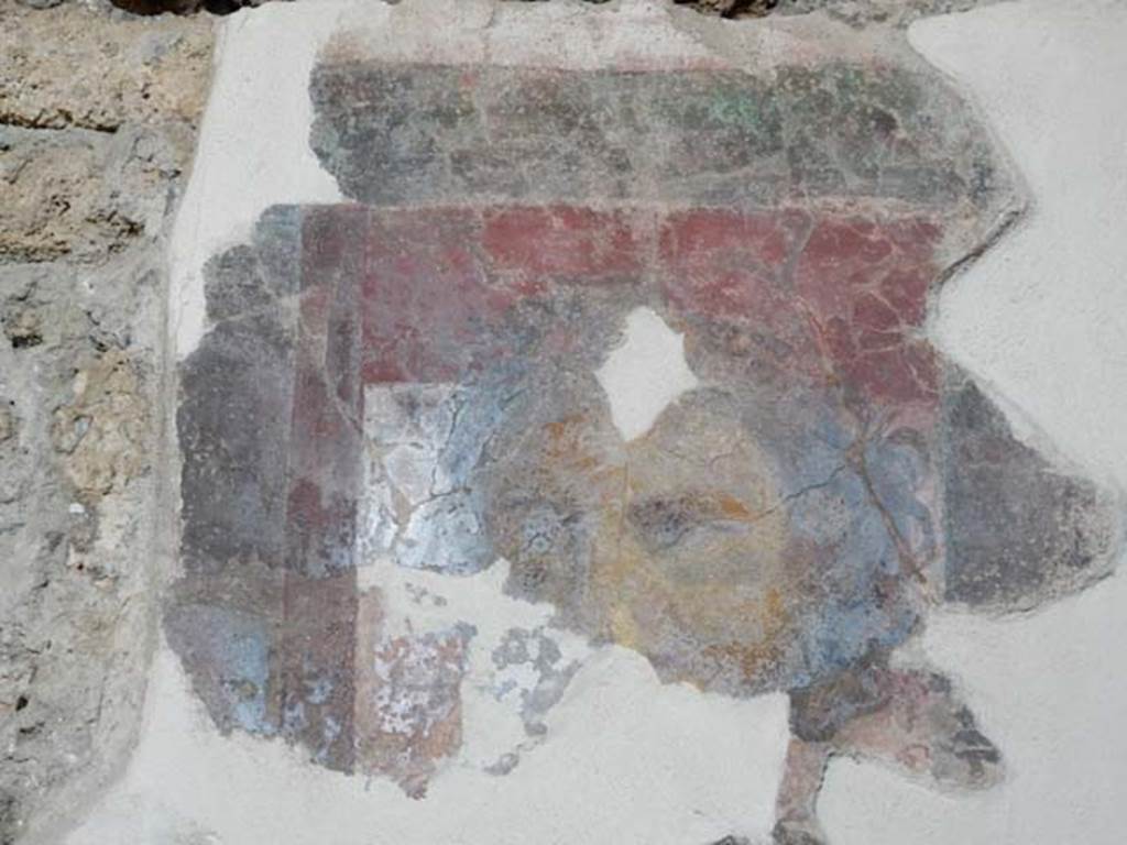I.6.2 Pompeii. May 2016. Painted face, from north wall of north wing. Photo courtesy of Buzz Ferebee.