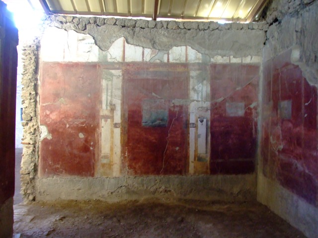 I.6.4 Pompeii.  March 2009.  Room 2, South wall. Remains of faded wall painting in centre.