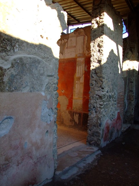 I.6.4 Pompeii.  March 2009. Room 5, East wall. Painted flying figure at north end.