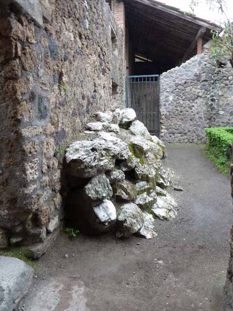 I.6.4 Pompeii. March 2009. Room 8, east wall with hearth and latrine.