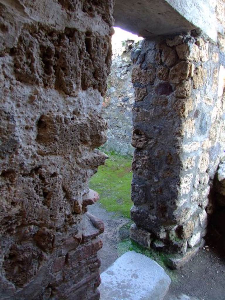 I.6.4 Pompeii. March 2009. Doorway to Room 8, Kitchen.