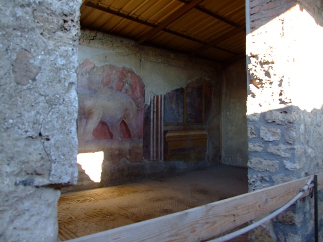 I.6.4 Pompeii. December 2005. Room 11, Room of the Elephants – showing fine mosaic floor and painting on east wall.