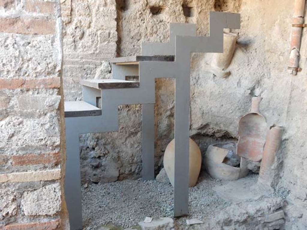 I.6.7 Pompeii. May 2016. Looking south-east towards east end of kitchen, with modern outline of steps to upper floor above the area of the latrine in the kitchen.
Photo courtesy of Buzz Ferebee.