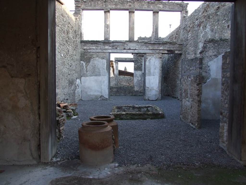 I.6.9 Pompeii. December 2007. Looking south across atrium towards tablinum with window to garden and corridor at side.
