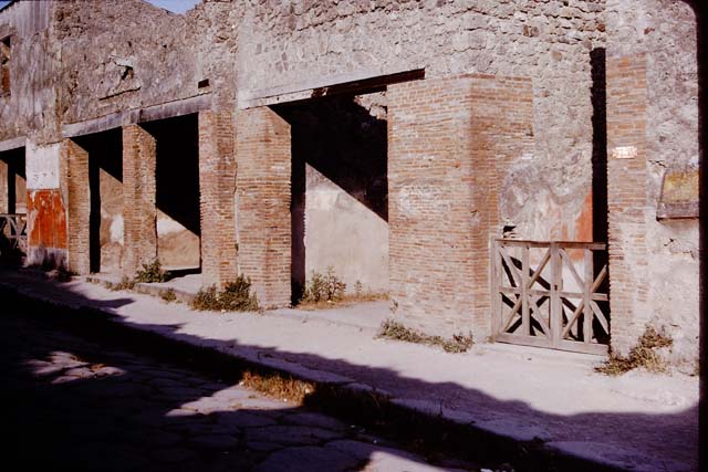 I.6.11 Pompeii. May 2010. Detail from restored compluvium, and rainwater spouts.