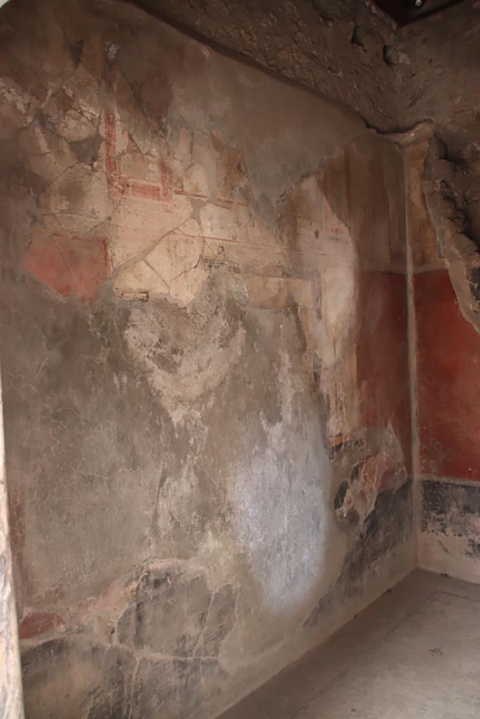 I.6.15 Pompeii. October 2023.
Room 11, looking east along north wall from doorway. Photo courtesy of Klaus Heese.