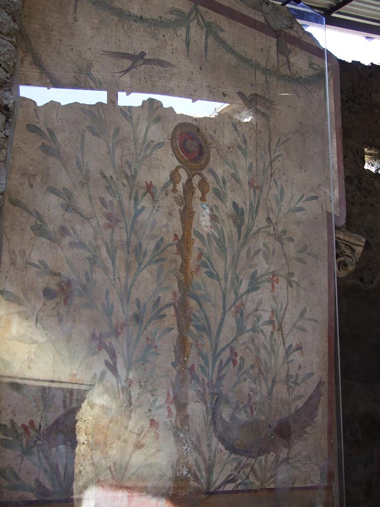 I.6.15 Pompeii. December 2007.
Room 9, small garden. Wall on west side, picture with birds, plants and a medallion.