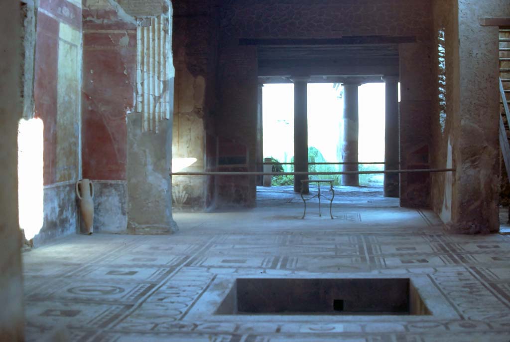 I.7.1 Pompeii. August 1976. Looking south across atrium towards tablinum, oecus and peristyle.
Photo courtesy of Rick Bauer, from Dr George Fay�s slides collection.

