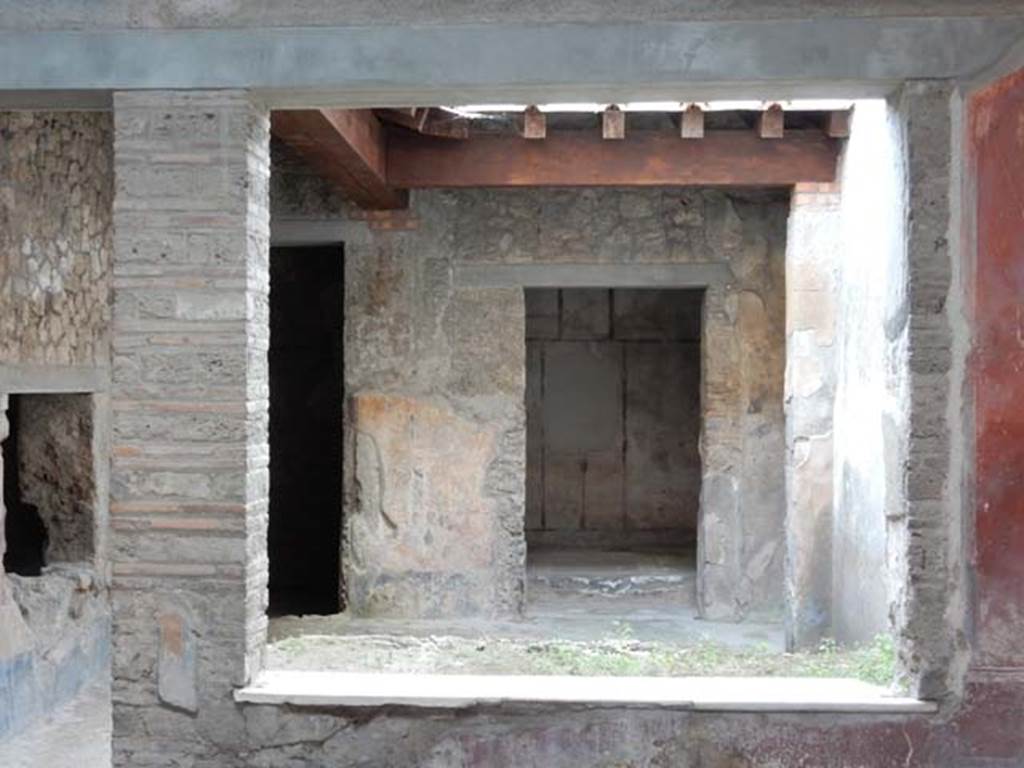 .7.3 Pompeii. May 2017. Looking south through window from atrium to garden.
Photo courtesy of Buzz Ferebee.