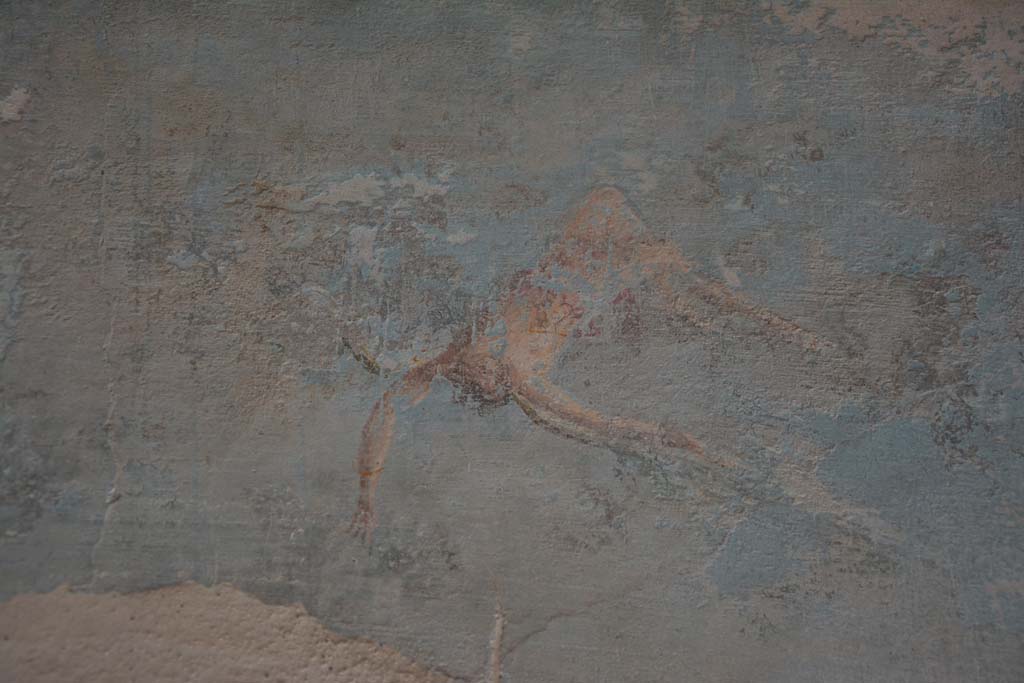 I.7.7 Pompeii. October 2019. Detail from central painting on east wall showing Icarus falling from the sky.
Foto Annette Haug, ERC Grant 681269 D�COR.

