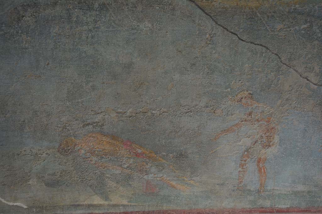 I.7.7 Pompeii. October 2019. Detail from central painting on east wall showing the dead body of Icarus retrieved by a fisherman.
Foto Annette Haug, ERC Grant 681269 D�COR.
