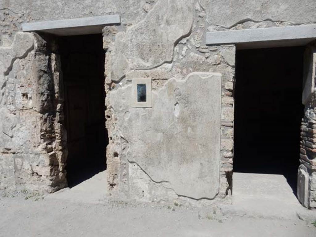 I.7.11 Pompeii. May 2017. Looking east towards doorways on south-east side of atrium. On the left is the doorway to a cubiculum, on the south side of entrance at I.7.11. On the right is the doorway into the triclinium, in the south-east corner of the atrium. Photo courtesy of Buzz Ferebee.