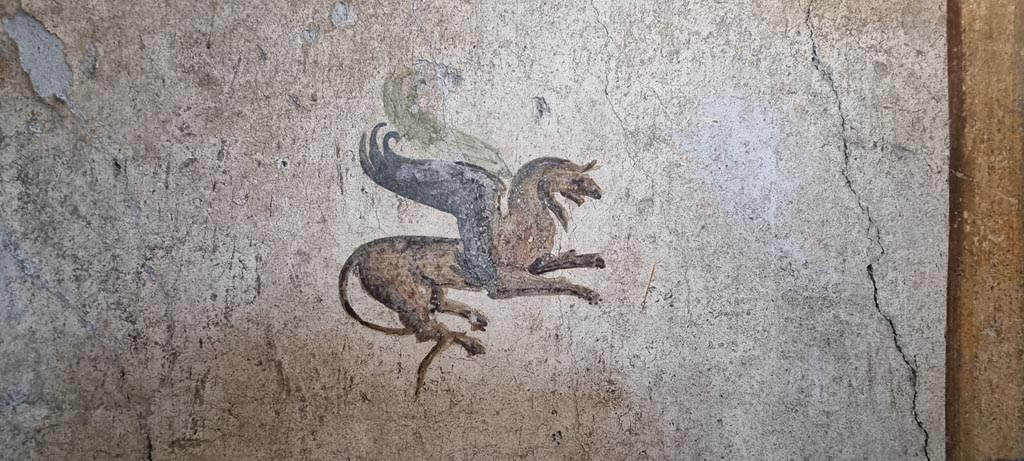 I.7.11 Pompeii. December 2023. Detail from north panel on east wall. Photo courtesy of Miriam Colomer.