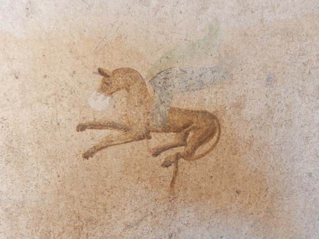 I.7.11 Pompeii. May 2017. Painting in centre of south panel on east wall. Photo courtesy of Buzz Ferebee.