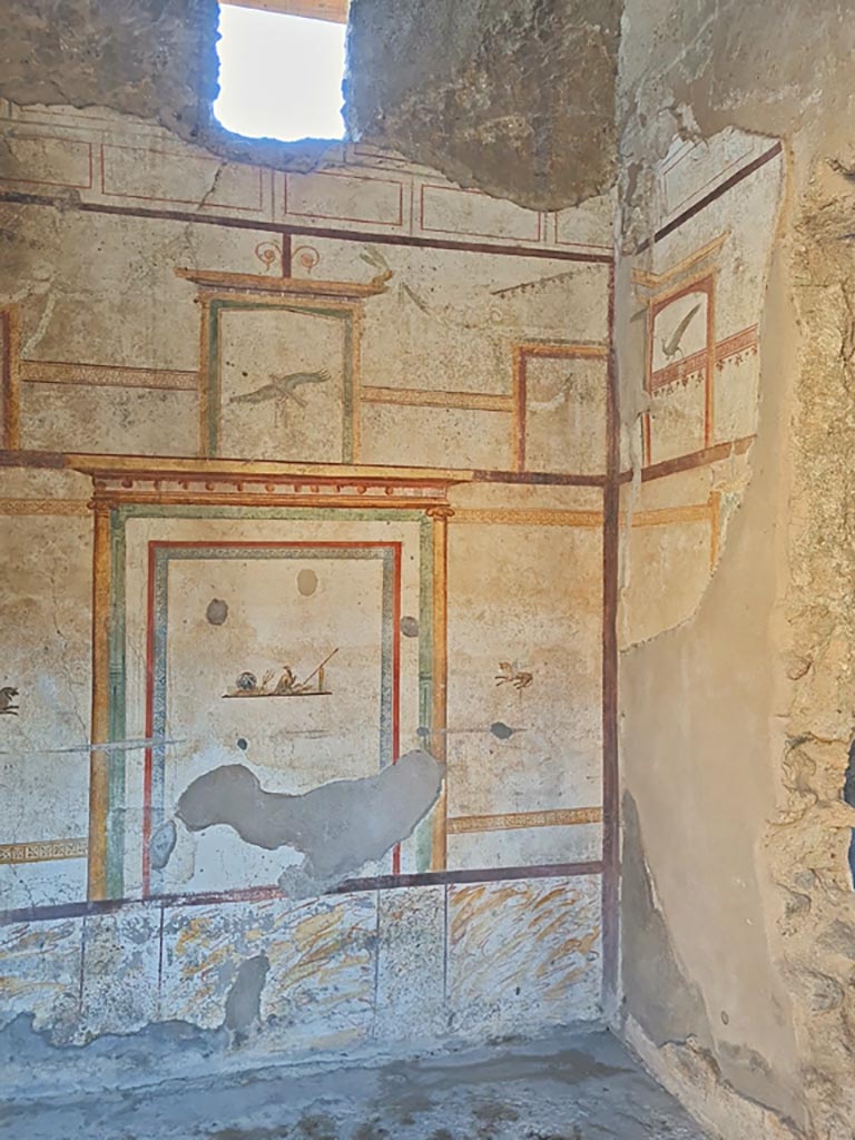 I.7.11 Pompeii. March 2024.
Looking towards east wall, south-east corner and south wall with hole into triclinium.
Photo courtesy of Giuseppe Ciaramella.