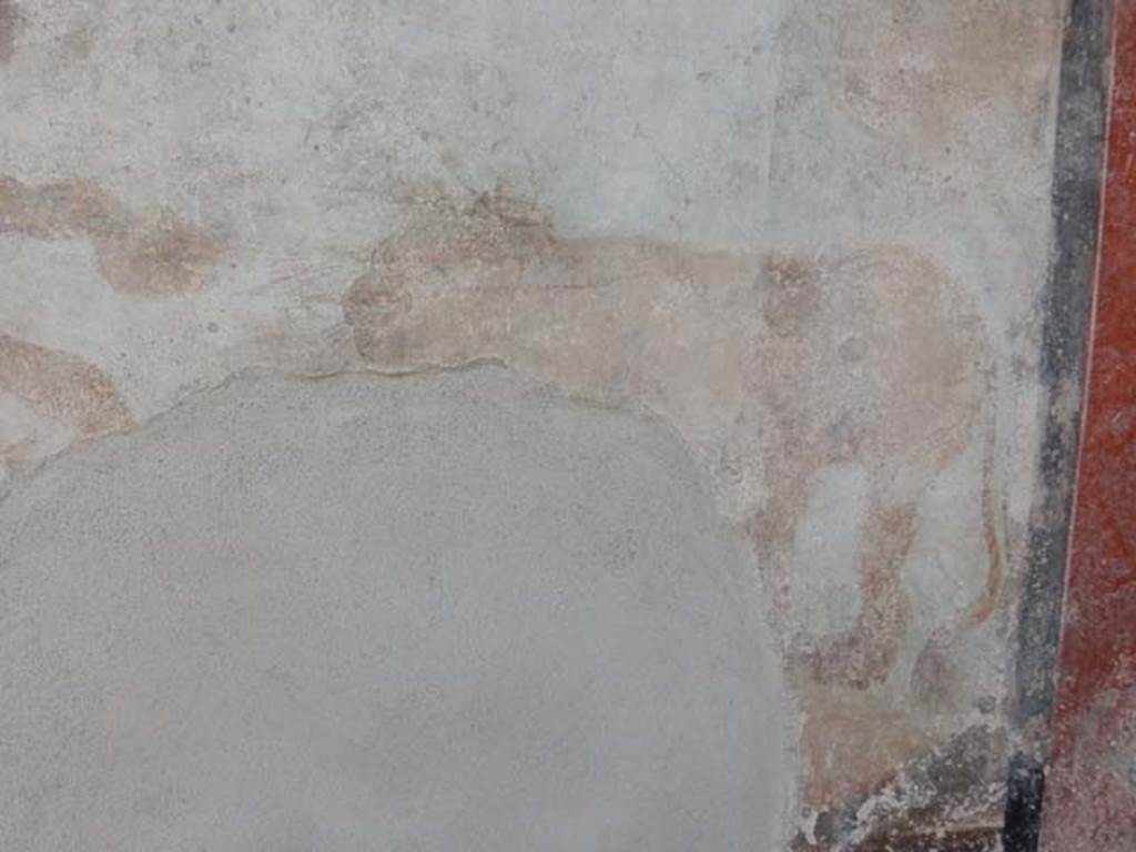 I.7.12 Pompeii. May 2017. South wall in south-west corner with painting of waiting lion. Photo courtesy of Buzz Ferebee.