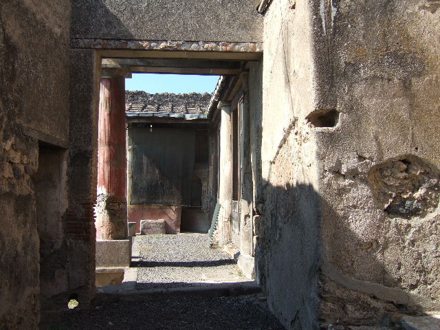 I.7.12 Pompeii. December 2006. Looking south into doorway to cubiculum, on west side of kitchen.