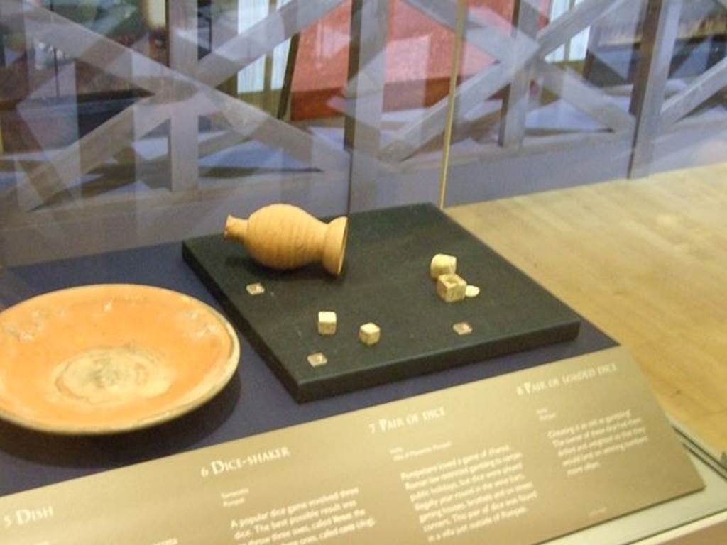 I.8.5 Pompeii. Pair of loaded dice (On right). SAP 7034b. Photographed at “A Day in Pompeii” exhibition at Melbourne Museum. September 2009.