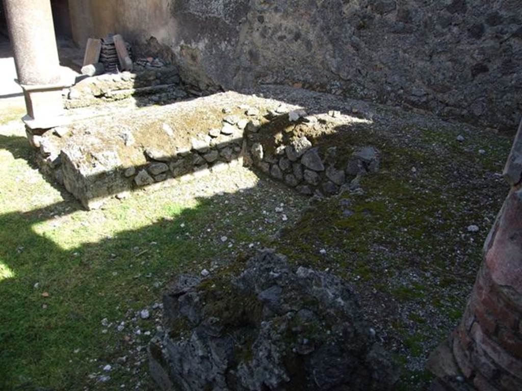 I.8.9 Pompeii. March 2009. Room 9 and garden area. Looking north-east across triclinium.