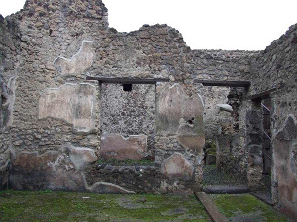 I.8.14 Pompeii. December 2007. Room 2, looking north across atrium.
To the north of the atrium (2) follows the small courtyard (7) in which most of the amphorae were found; from it, passing into the small room (8), you enter to the West the kitchen, with adjoining latrine (10) and (11) and, to the East, into room (9), the only one that preserves more substantial remains of pictorial decoration of 4th style.
Guardando a nord attraverso l'atrio 2.
Segue al Nord dell'atrio (2) il cortiletto (7) nel quale si rinvenne la maggior parte delle anfore; da esso, superando il piccolo ambiente (8), si accede ad Ovest alla cucina, con annessa latrina (10) e (11) e, ad Est all’ambiente (9), l’unico che conserva più consistenti resti di decorazione pittorica di IV stile.
See/Vedi Carratelli, G. P., 1990-2003. Pompei: Pitture e Mosaici: Vol. I. Roma: Istituto della enciclopedia italiana, p. 834-5.