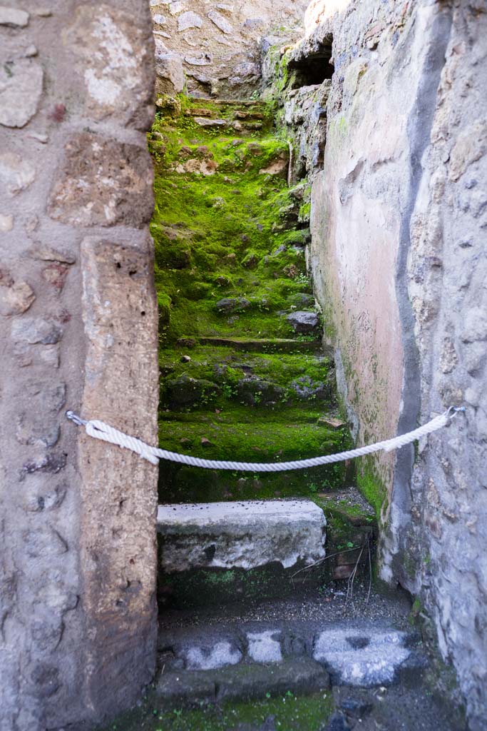 I.8.17 Pompeii. December 2021.
Staircase to upper floor next to room 19. Photo courtesy of Johannes Eber.