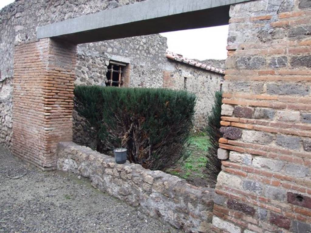 I.8.17 Pompeii. December 2007. Room 17, peristyle garden.
Looking south-east from the north end of the garden, towards windows of rooms 23, 21 and 22. These rooms were not accessible.
According to P.P.M., room 23 is decorated in the fourth style, with white walls divided into panels bordered in red and with depictions of birds, a swan and panther.
Next to it is room 21, the kitchen, and next to that is room 22, the latrine.
See Carratelli, G. P., 1990-2003. Pompei: Pitture e Mosaici: Vol. I. Roma: Istituto della enciclopedia italiana, pp. 908-913.