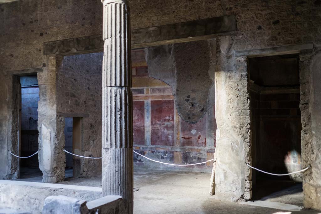 I.8.17 Pompeii. December 2021.
Looking north-west across atrium 3 towards room 13, ala in centre of north side of atrium, with room 12, on right. Photo courtesy of Johannes Eber.