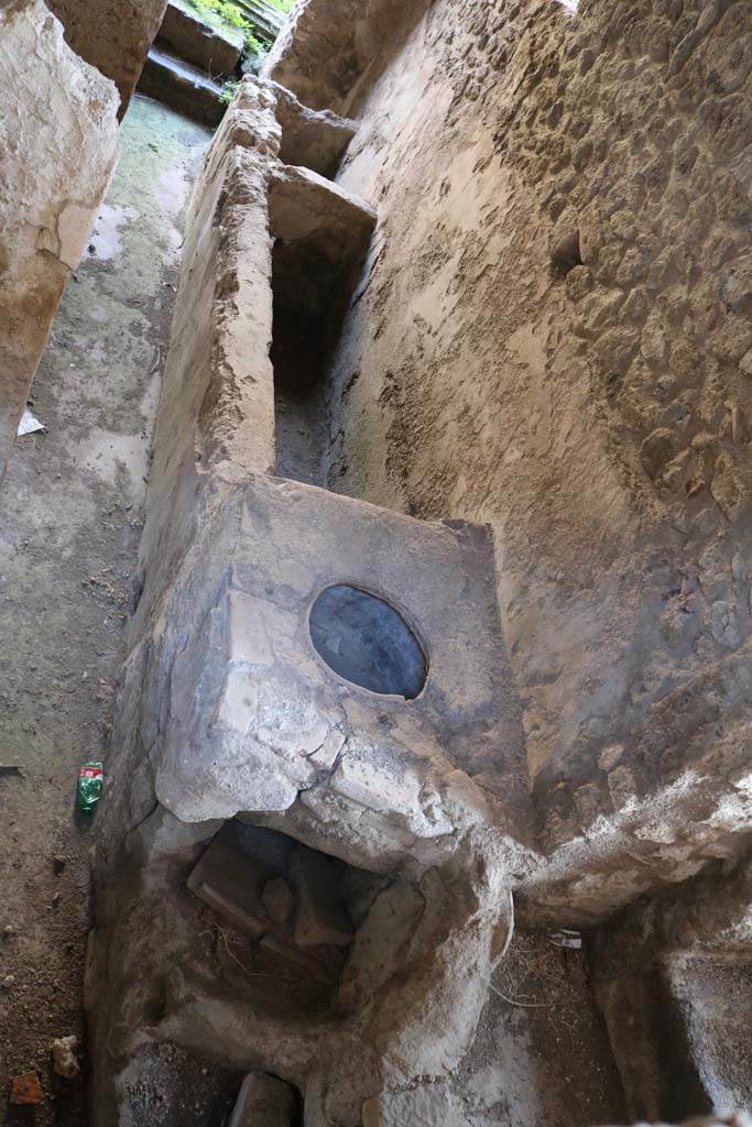 I.8.19 Pompeii. December 2018.
Looking through window to lower level on south side. Photo courtesy of Aude Durand.