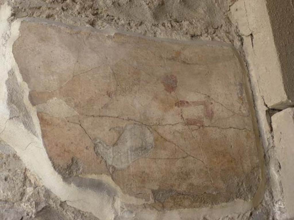 1.9.1 Pompeii. June 2012. East wall of vestibule, with remains of wall painting of Mercury and Hercules.
Hercules stands to the left and in the right of the painting is Mercury
Photo courtesy of Michael Binns.