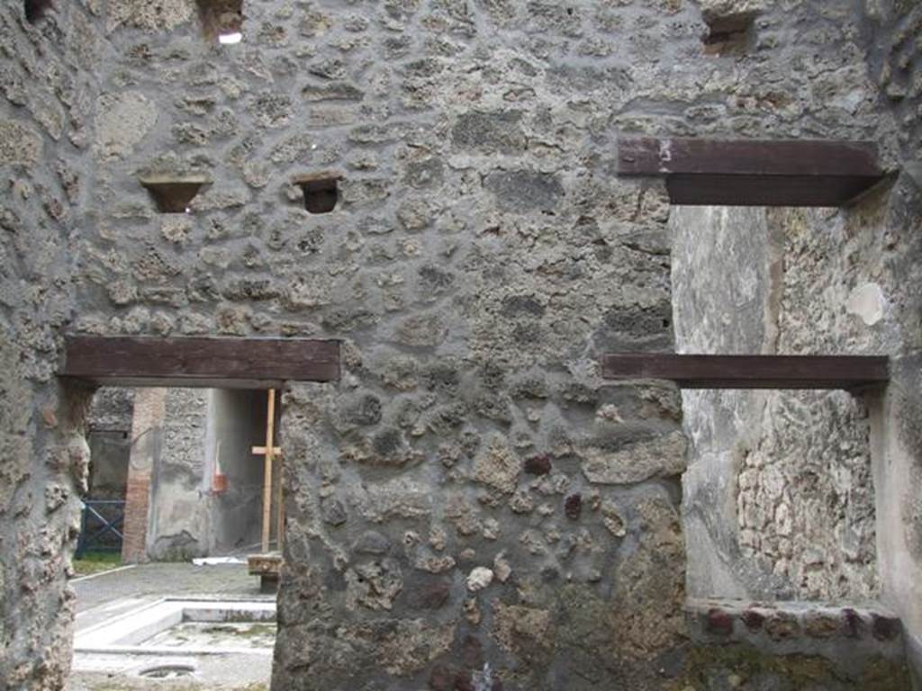 I.9.1 Pompeii. March 2009. Room 3, South wall with window and door to atrium.