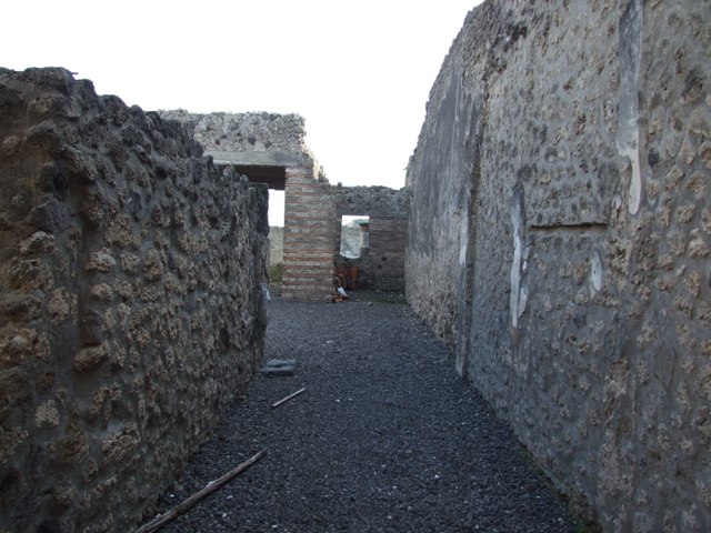 I.9.3 Casa di Successus. Looking south east from entrance across a room (Triclinium?) towards doorway into I.9.4.