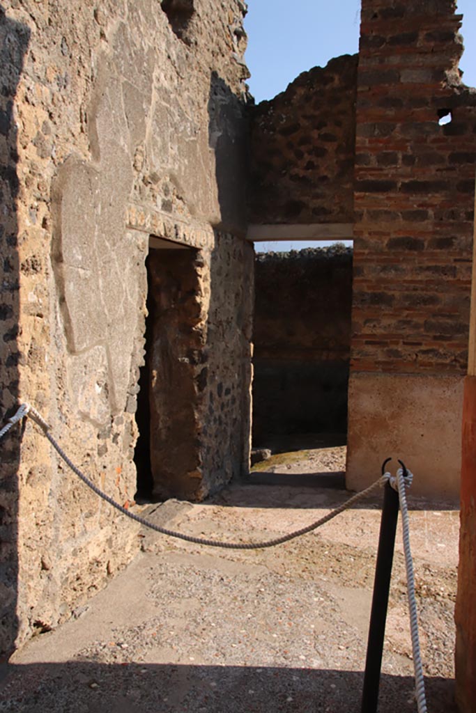 I.9.5 Pompeii. October 2022.
Doorways to room 14 (left) and room 15 (ahead). Photo courtesy of Klaus Heese.