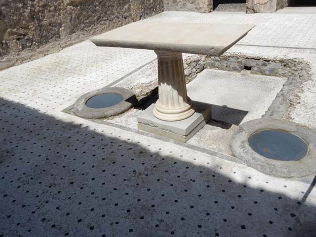 I.9.5 Pompeii, May 2018. Room 3, looking north across atrium, and marble table near impluvium. 
Photo courtesy of Buzz Ferebee.


