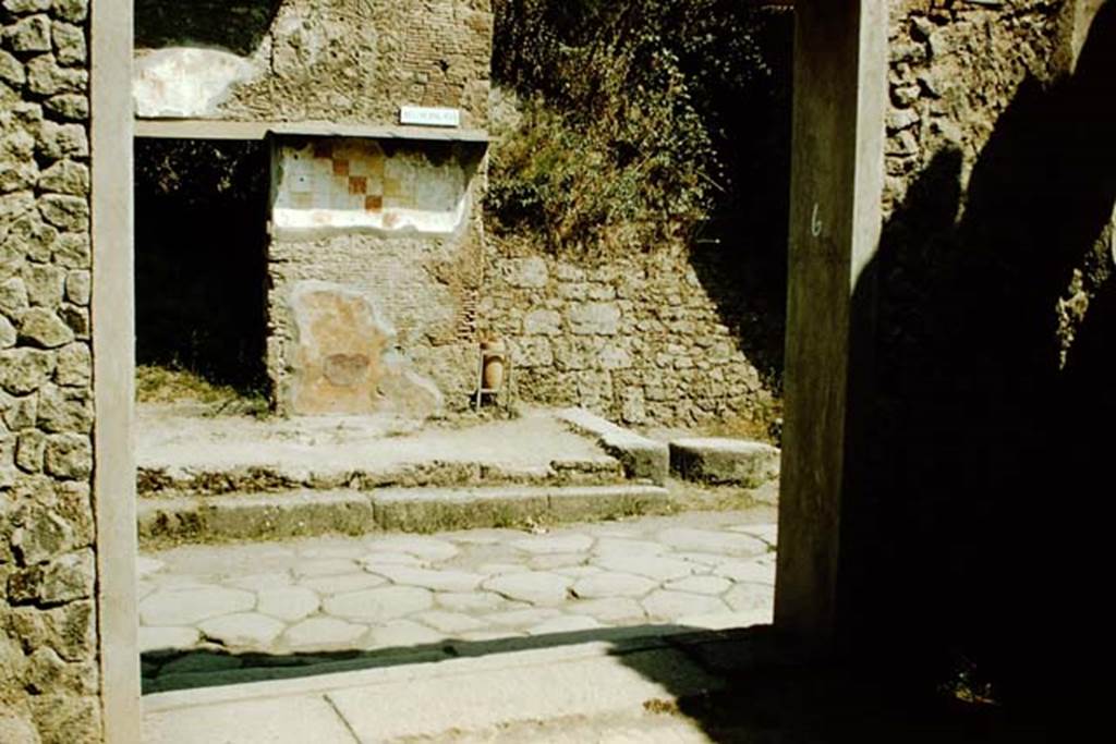 I.9.6 Pompeii. 1957. Looking north through entrance doorway, across Via dell�Abbondanza towards the doorway of IX.13.6. Photo by Stanley A. Jashemski.
Source: The Wilhelmina and Stanley A. Jashemski archive in the University of Maryland Library, Special Collections (See collection page) and made available under the Creative Commons Attribution-Non Commercial License v.4. See Licence and use details.
J57f0220
